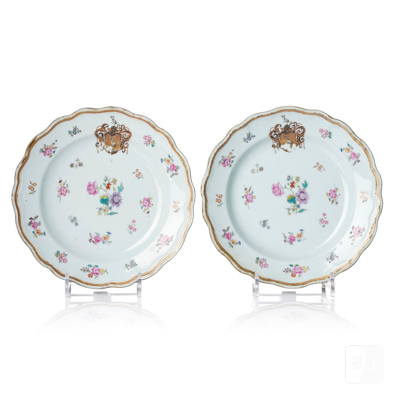 A pair of famille rose armorial dishes,